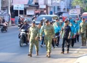 Kodim 1409/Gowa Perkuat Soliditas Lewat Gerak Jalan dan Senam Bersama